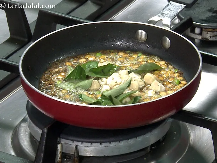 Step 44 – Add some curry leaves.&nbsp;