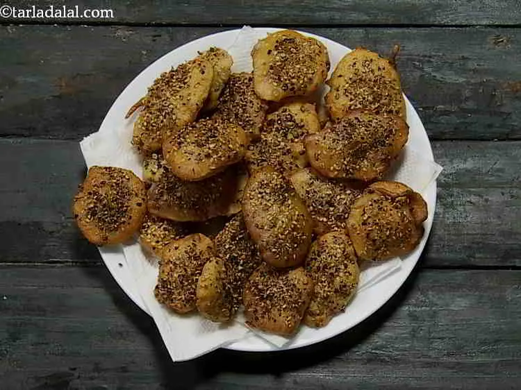 Step 15 – Drain the purple yam fritters on an absorbent paper.