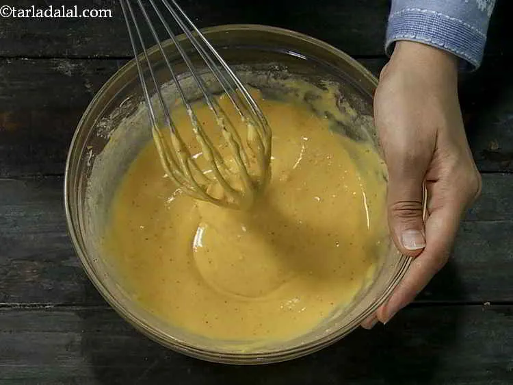 Step 8 – Add approximately 3/4th cup of water. This batter should be thin but not runny. It …