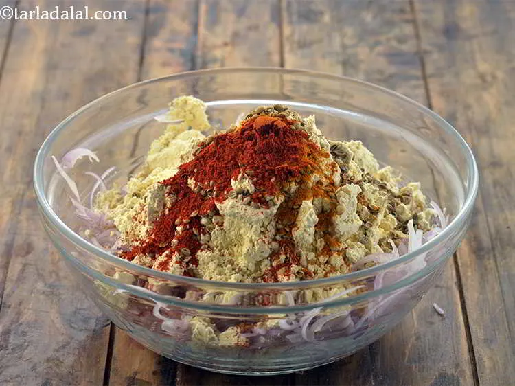 Step 10 – Also, add turmeric powder and chilli powder.