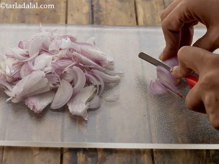 Step 5 – Peel and rinse 5 medium sized onions. Slice them thinly with the help of a …