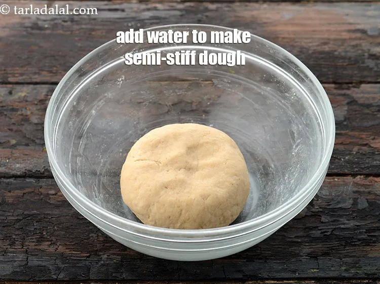 Step 16 – Add approx. 5 tbsp water as required and knead into a semi-soft dough.