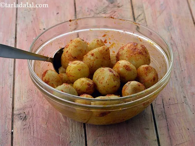 Step 27 – Drain the potatoes and keep aside.