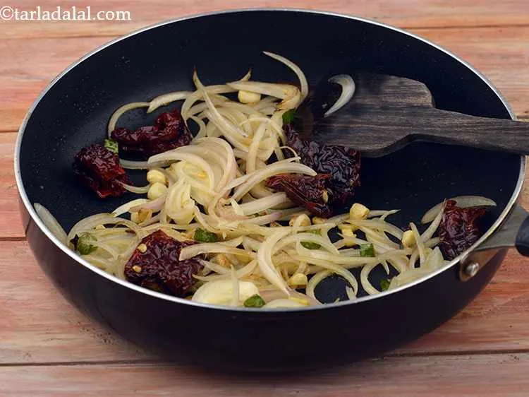 Step 11 – Add the onions and saut&eacute; on a medium flame for 1 minute. You can add …