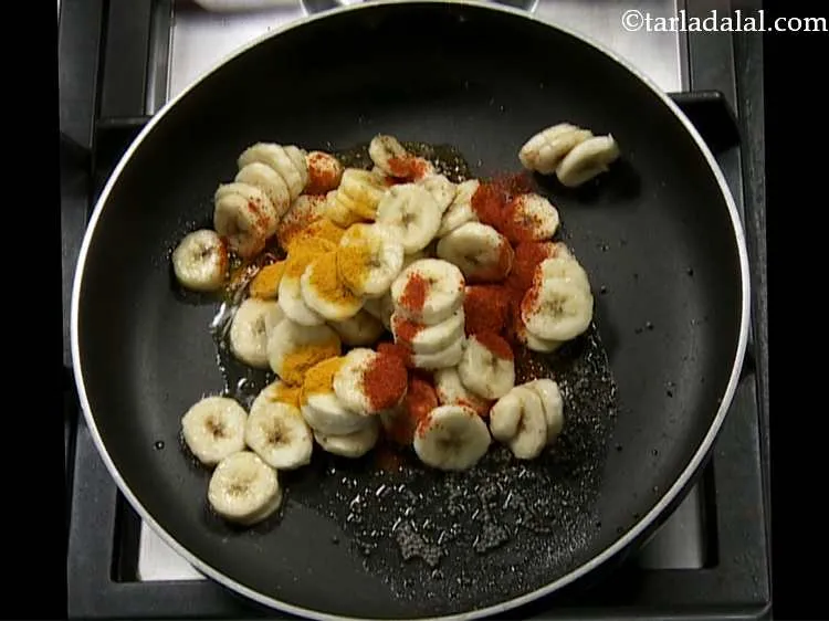 Step 5 – Add turmeric powder to the pan.