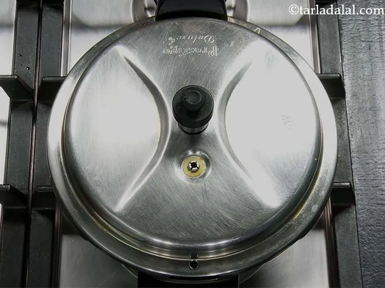 Step 13 – Mix well and pressure cook for 3 whistles. Alternately, you can cook the dal on …