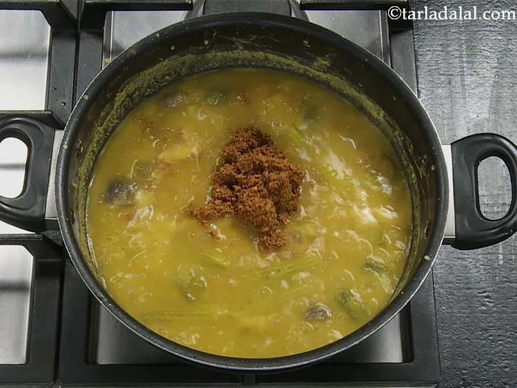 Step 25 – Now add the prepared sambar masala paste that we had keep aside.