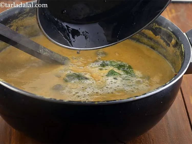 Step 30 – Pour this tempering over the prepared&nbsp;<strong>Kerala sambar recipe | Kerala style sambhar with coconut | …
