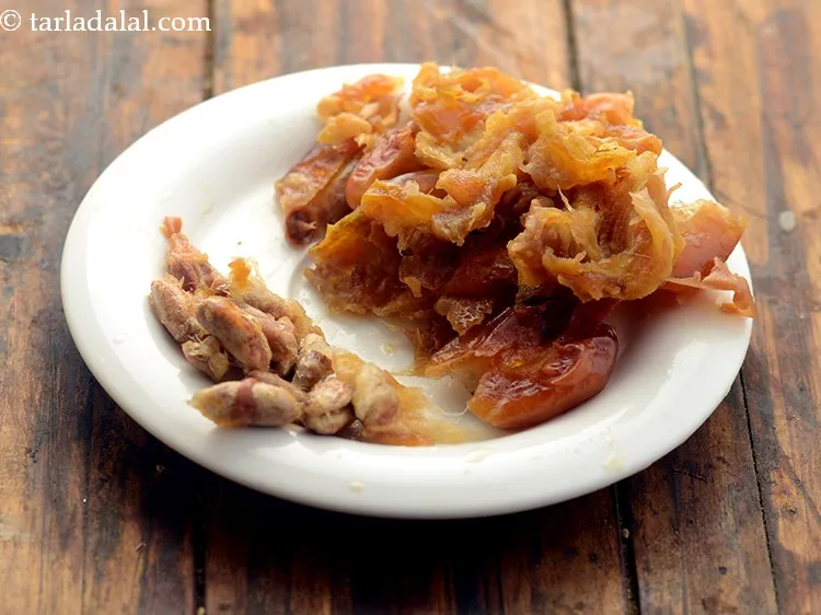 Step 5 – After 30 minutes, drain and deseed khajur.