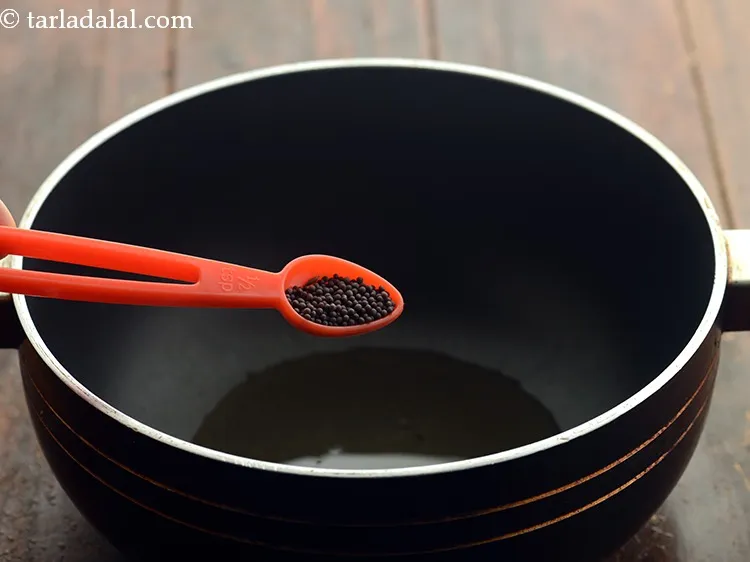 Step 3 – Add the mustard seeds.