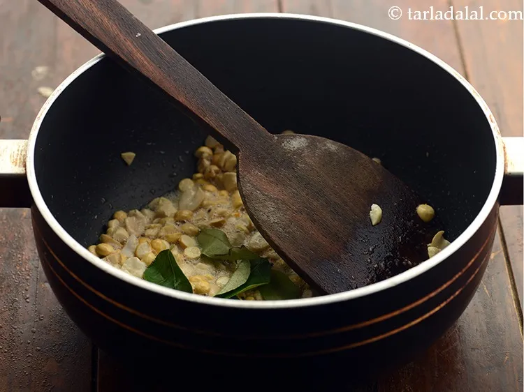 Step 7 – Add the curry leaves.