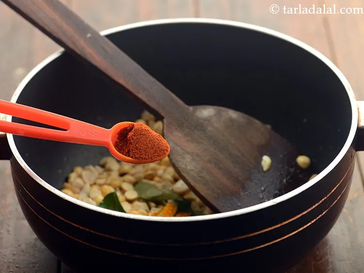 Step 9 – Add chilli powder. Adjust it according to your preference of spice.