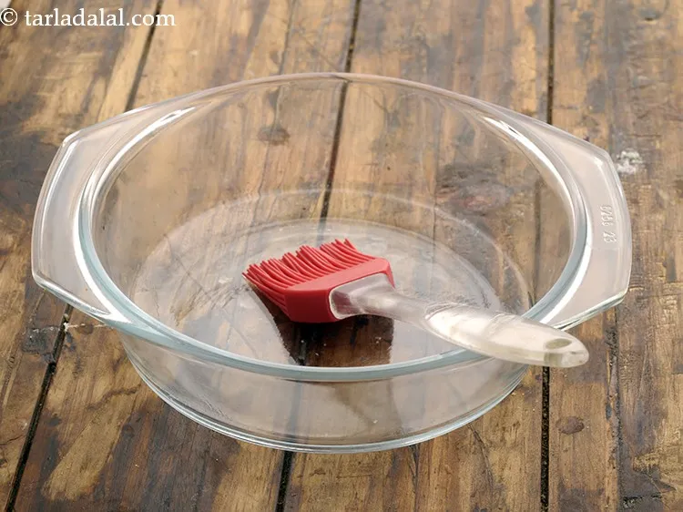 Step 13 – To cook <strong>khaman dhokla in a microwave</strong>, grease 150 mm. (6&quot;) diameter microwave safe dish …