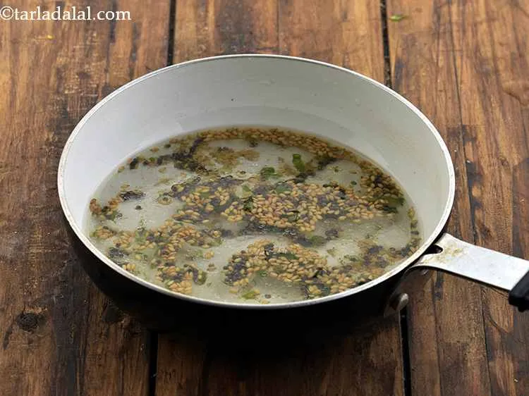 Step 19 – Remove from the flame, add &frac12; cup of water and mix well. Be careful while …