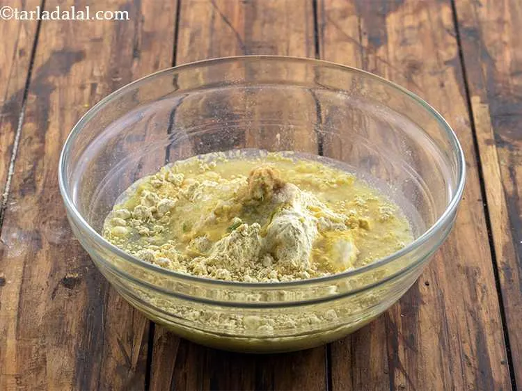 Step 8 – <p>Add <a href="https://www.tarladalal.com/glossary-salt-namak-table-salt-418i"><u>salt&nbsp;</u></a> and approx. ¾ cup of water.</p>