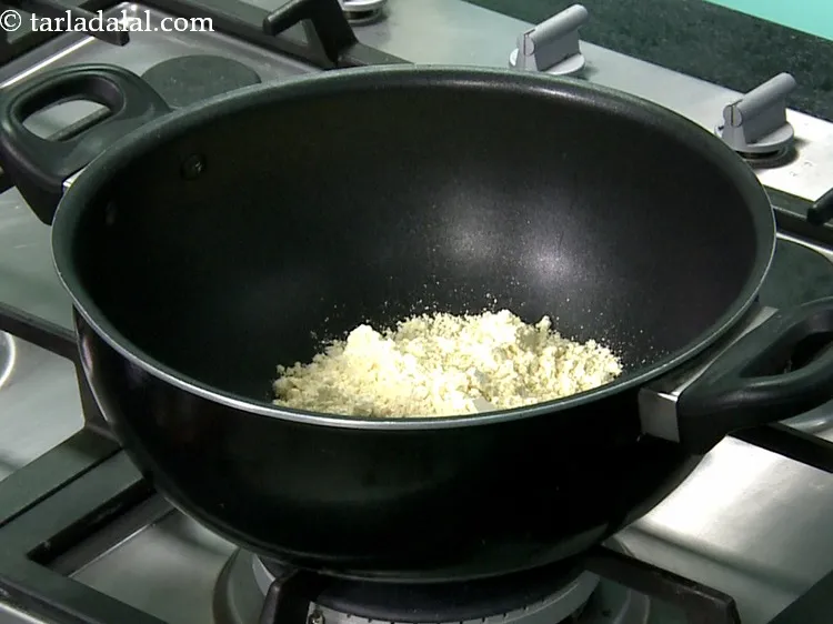 Step 7 – In a deep non-stick pan, take the besan. This is the hero ingredient of this …