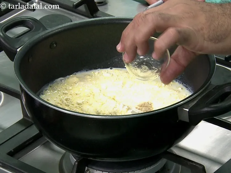 Step 10 – Add lemon juice. If your curd is sour then skip adding lemon juice.