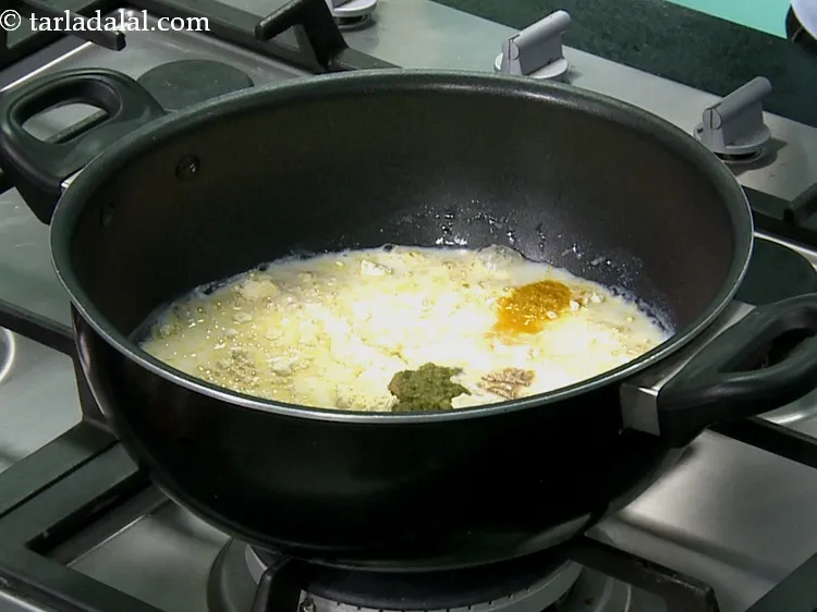 Step 12 – Add ginger-green chilli paste. Refer this recipe to make&nbsp;<a href="https://www.tarladalal.com/Ginger-Green-Chilli-Paste-33529r" target="_blank">homemade fresh&nbsp;Ginger Green Chilli Paste</a>.