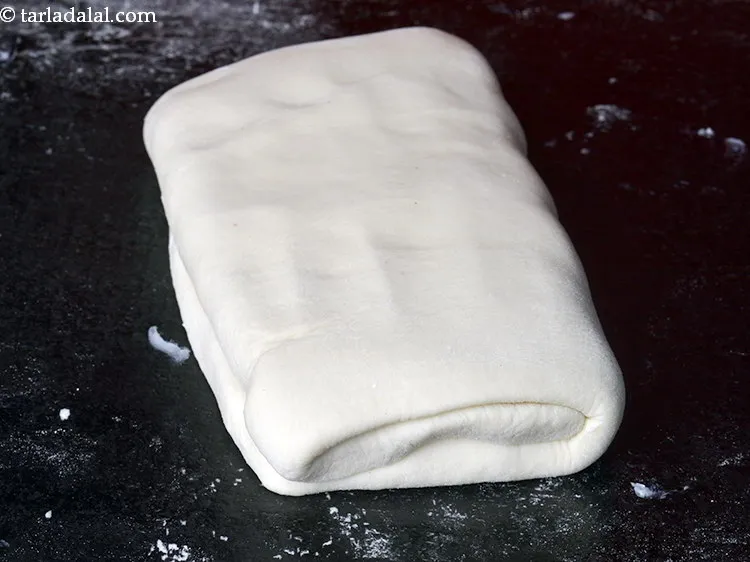 Step 18 – Then fold the other side overlapping the first side. Make sure the edges are also …