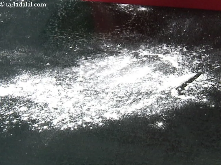 Step 19 – Dust the dough surface with a little plain flour on both sides so it is …