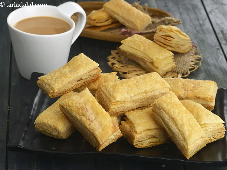 Step 35 – Cool the&nbsp;<strong>khari biscuits | puff pastry biscuit | Indian vegetarian khari biscuit |</strong>&nbsp;lightly and serve …