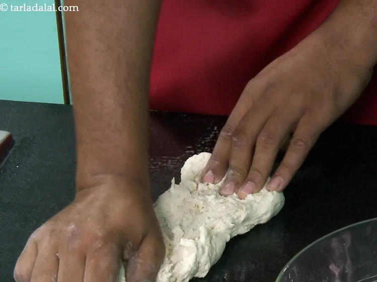 Step 7 – At this moment the dough is stiff and tearing, we want it to be smooth …