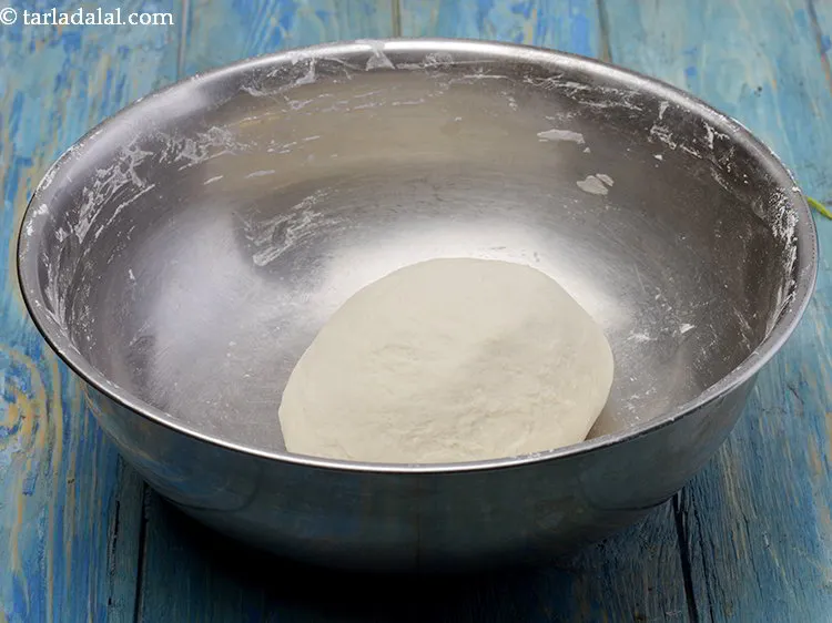 Step 9 – Make sure you knead the dough lightly, while stretching it and pulling it for about …