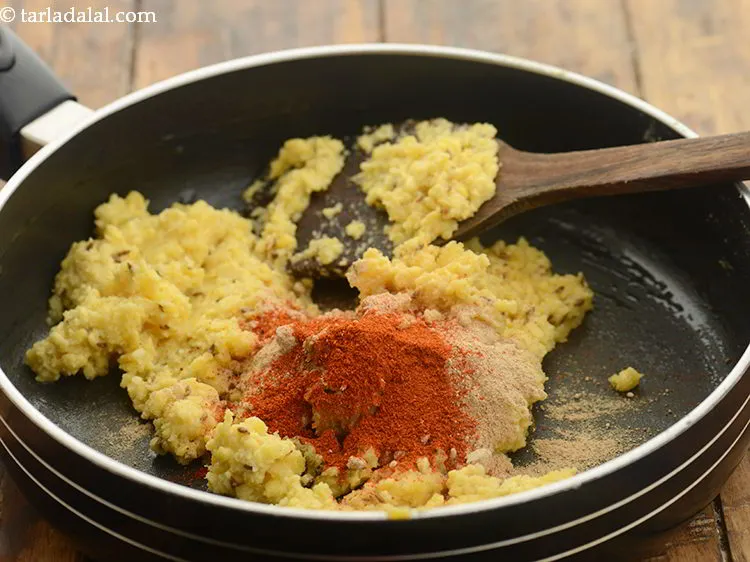 Step 21 – Add chilli powder. The quantity can be adjusted to suit your liking.