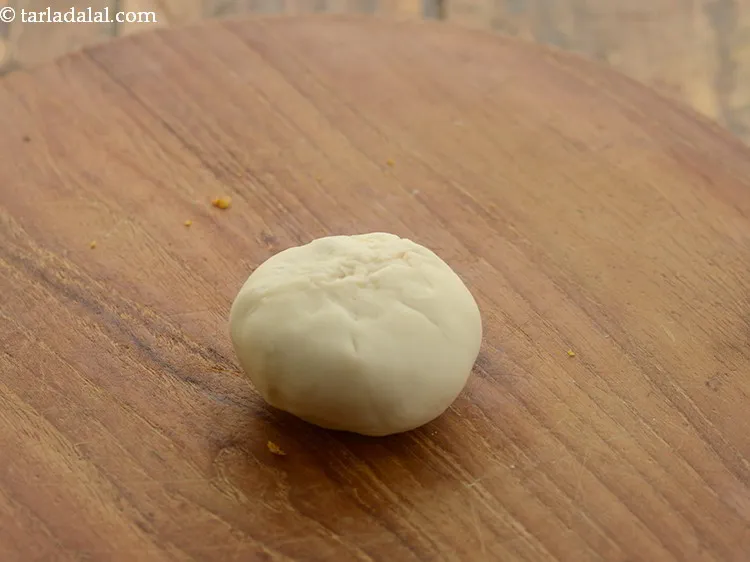 Step 30 – Seal it tightly and remove any excess dough and press it lightly.