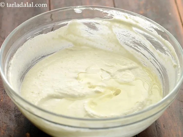 Step 9 – Add the oil. This will help in making soft white <strong>khatta dhoklas</strong>.