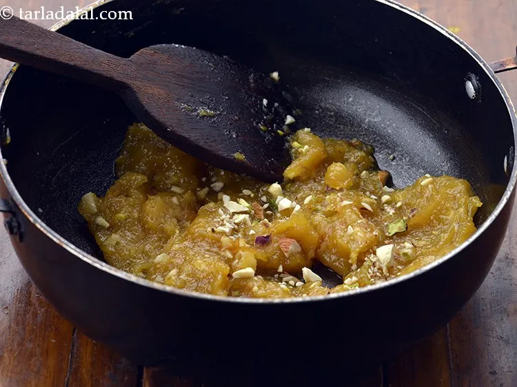 Step 16 – Garnish&nbsp;with 2 tbsp&nbsp;<a href="https://www.tarladalal.com/glossary-chopped-mixed-nuts-928i">chopped mixed nuts</a>&nbsp;(cashewnuts , pistachios and almonds).