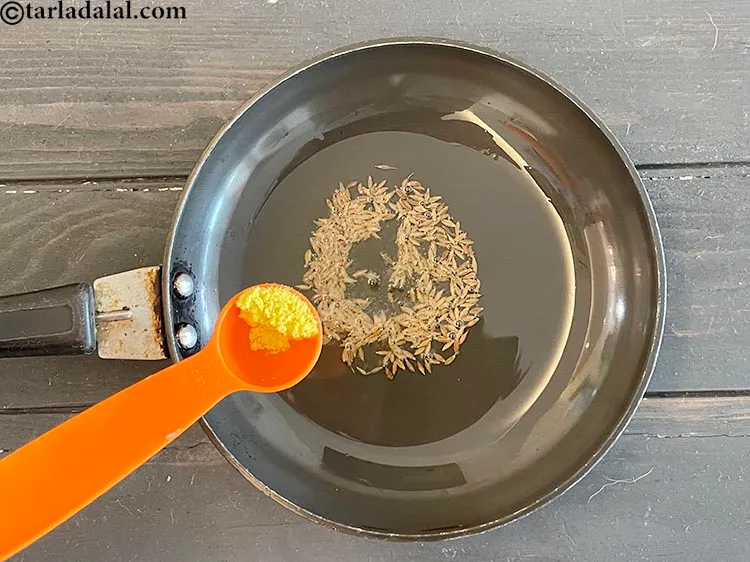 Step 15 – Add&nbsp;<meta charset="UTF-8" />1/4 tsp&nbsp;<a href="glossary-asafoetida-hing-113i">asafoetida (hing)</a>.