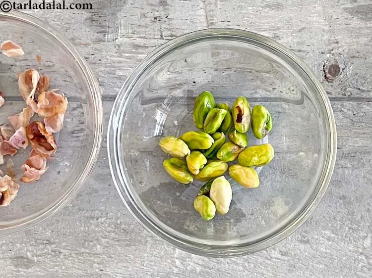 Step 27 – Drain the water, remove the skin from the pista. Chop it. Your pista is ready …