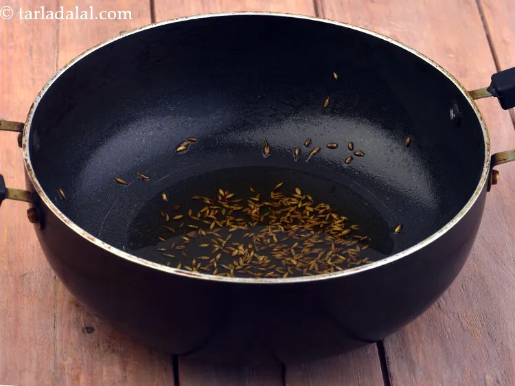 Step 15 – Add 1 tsp&nbsp;<a href="https://www.tarladalal.com/glossary-cumin-seeds-jeera-zeera-381i">cumin seeds (jeera)</a>.