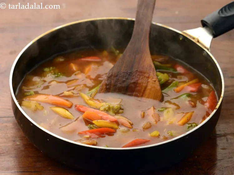 Step 22 – Mix well and cook on a high flame for 1 to 2 minutes, while stirring …