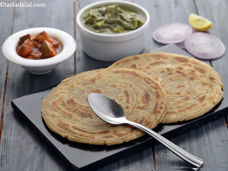 Step 26 – Serve the hot <strong>lachha paratha (whole wheat laccha paratha)</strong> immediately with some chilled curds. If …