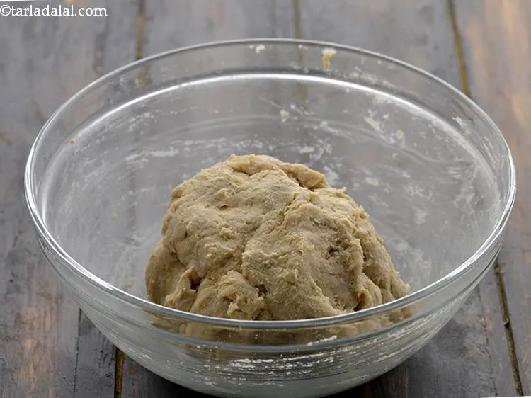 Step 8 – Knead into a soft dough using approx. &frac12; cup of lukewarm water.