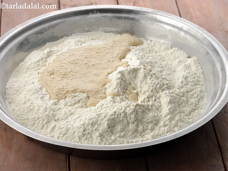 Step 9 – Add the baking powder and salt. Baking powder helps to make the&nbsp;<strong>ladi pav</strong>&nbsp;feather-light and soft. …