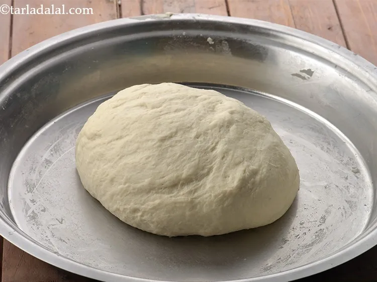 Step 16 – Stretch the dough back and fold until the&nbsp;<strong>ladi pav</strong>&nbsp;dough turns smooth and elastic. The dough …