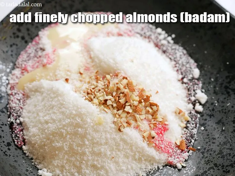 Step 6 – Add 1 tbsp finely <a href="https://www.tarladalal.com/glossary-chopped-almonds-865i">chopped almonds (badam)</a>.