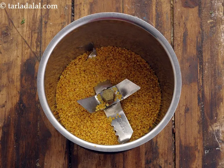 Step 2 – To make coarse masala for <strong>lahsun ka achar</strong>, in a mixer jar add mustard seeds. …