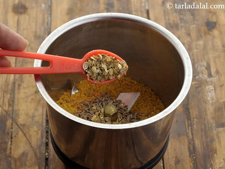 Step 5 – Add split coriander seeds