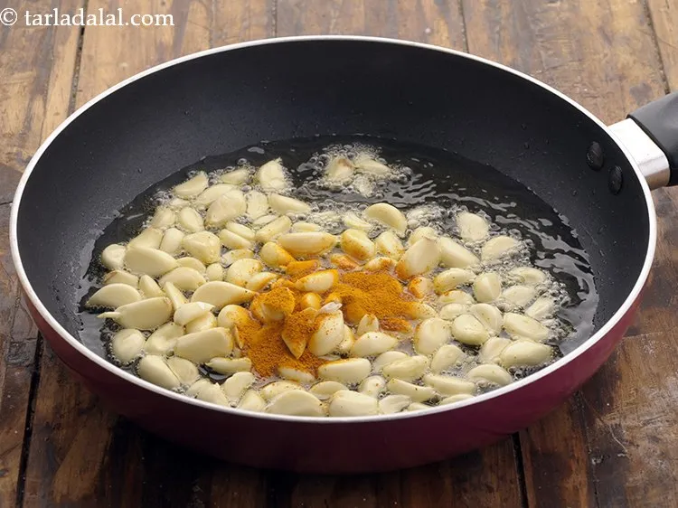 Step 10 – Add turmeric powder