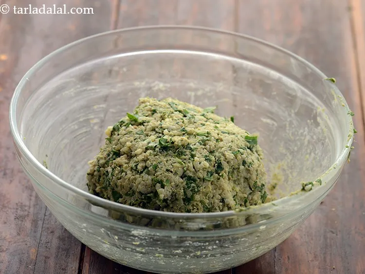 Step 17 – Mix well and gradually add water to form a dough, adding water if required.