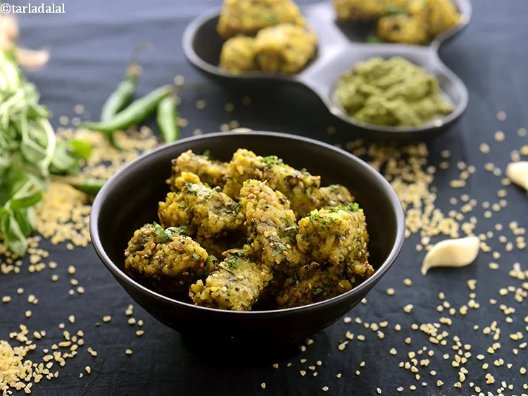 Step 30 – Serve <strong>broken wheat fenugreek muthia</strong> immediately garnished with coriander. If you enjoyed this recipe of …