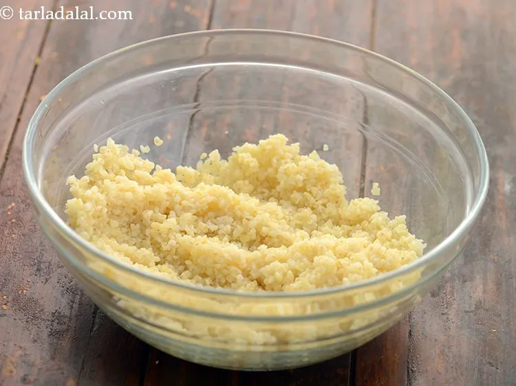 Step 7 – Transfer the cooked broken wheat in a deep bowl.