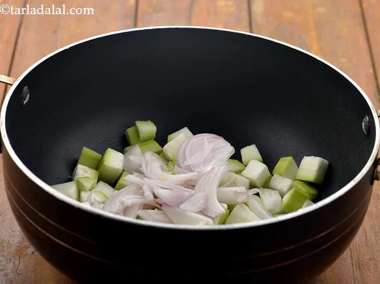 Step 9 – Add the onions. If you are Jain, then you can skip adding onions.