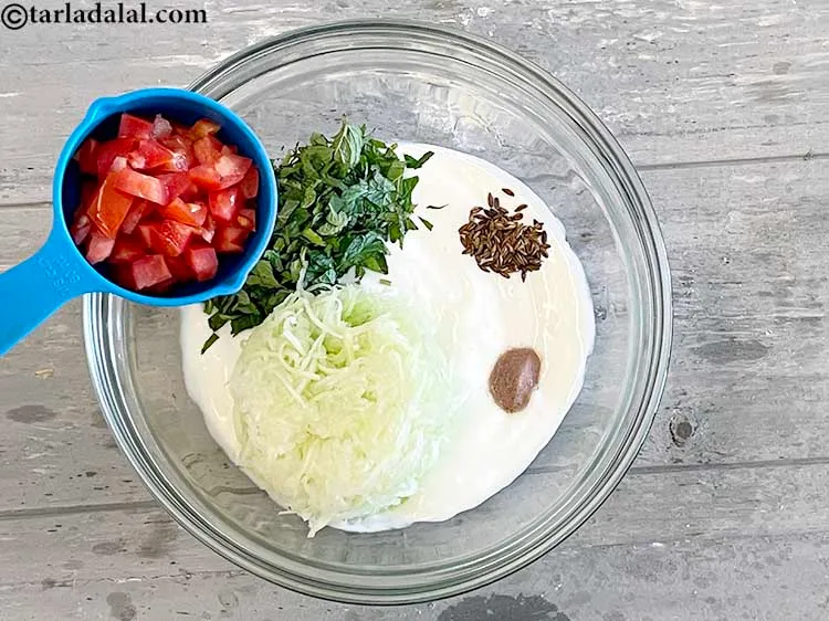 Step 17 – Add&nbsp;<meta charset="UTF-8" />1/4 cup&nbsp;<a href="glossary-chopped-tomatoes-779i">chopped tomatoes</a>.