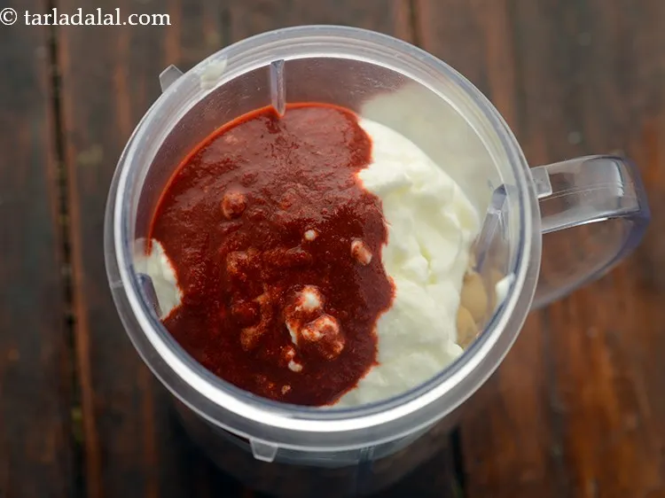 Step 12 – Add red chilli paste.