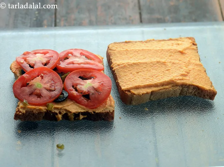 Step 21 – Put 4 tomato slices.